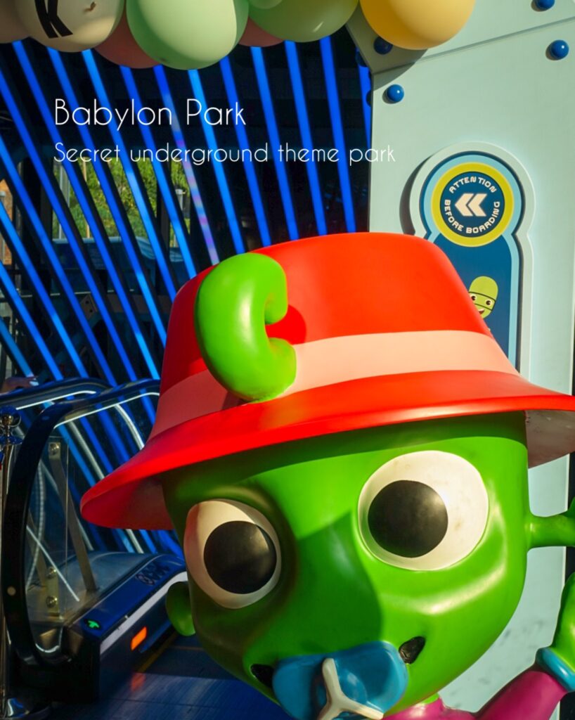 Babylon park is a secret underground theme park with free entry. You are greeted into the park by the park's mascot, a green alien with a red hat. You can also find London's only underground rollercoaster here.
