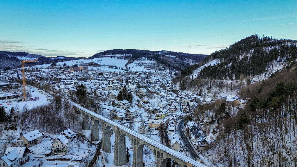 The Viaduct in Willingen is a railway bridge, located between the mountains of the Sauerland region. The viaduct is a railway bridge, over which trains pass once an hour in each direction. It looks especially beautiful in a snowy landscape.
