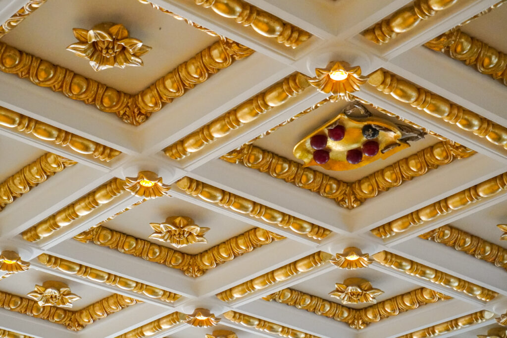 As you walk into the reception area of the Living Hotel De Medici, look up at the ceilings and admire gold-leaf plating in Renaissance style.
