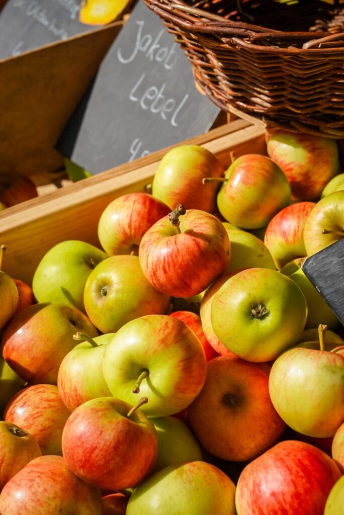 Fresh fruit is available at the weekly market in Muenster, taking place every Wednesday and Saturday. There are multiple varieties of apples - which are laid out on the market stalls in wooden boxes.