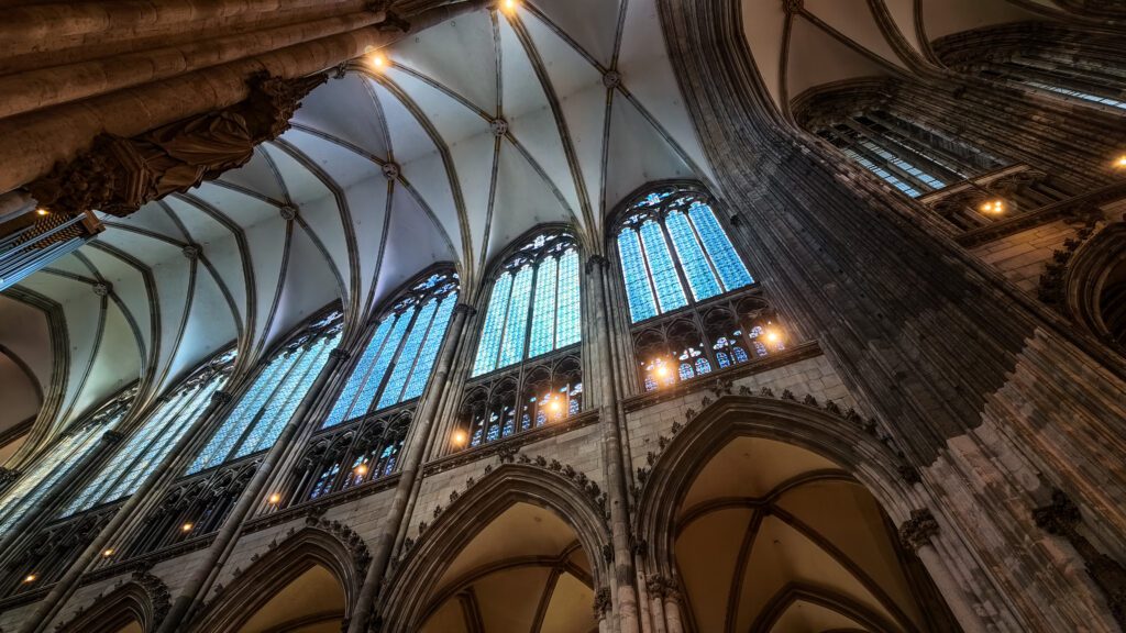 The Cologne Cathedral is the most iconic landmark of the city of Cologne in Germany - with impressive curved archways and stained glass windows. You can either explore the interior of the cathedral or climb to one of the top of the towers.